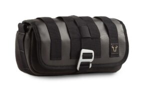 A SW-MOTECH Legend Gear Motorcycle Toolbag - LA5 camera bag with a strap.